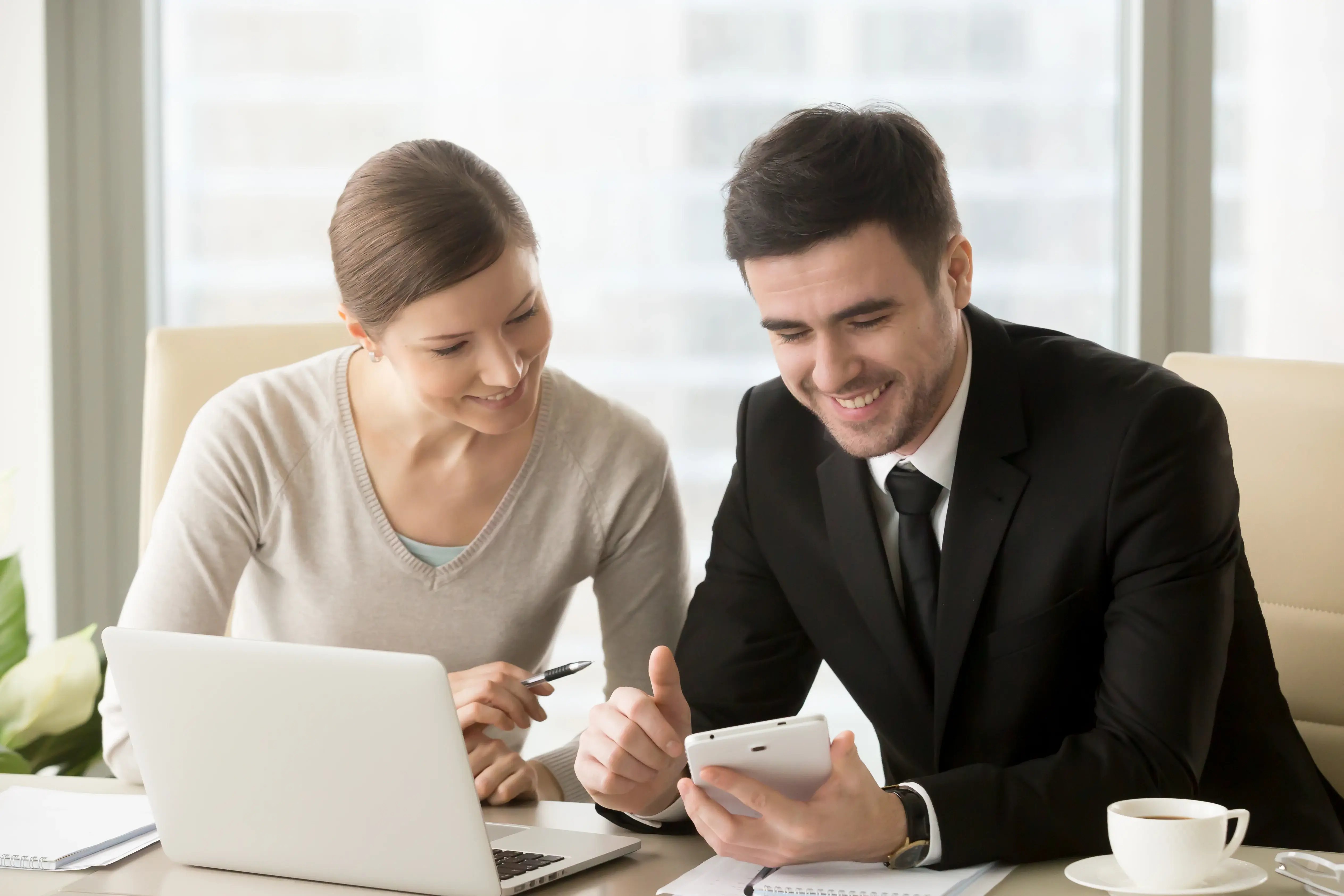 happy-business-partners-sorting-out-startup-ideas